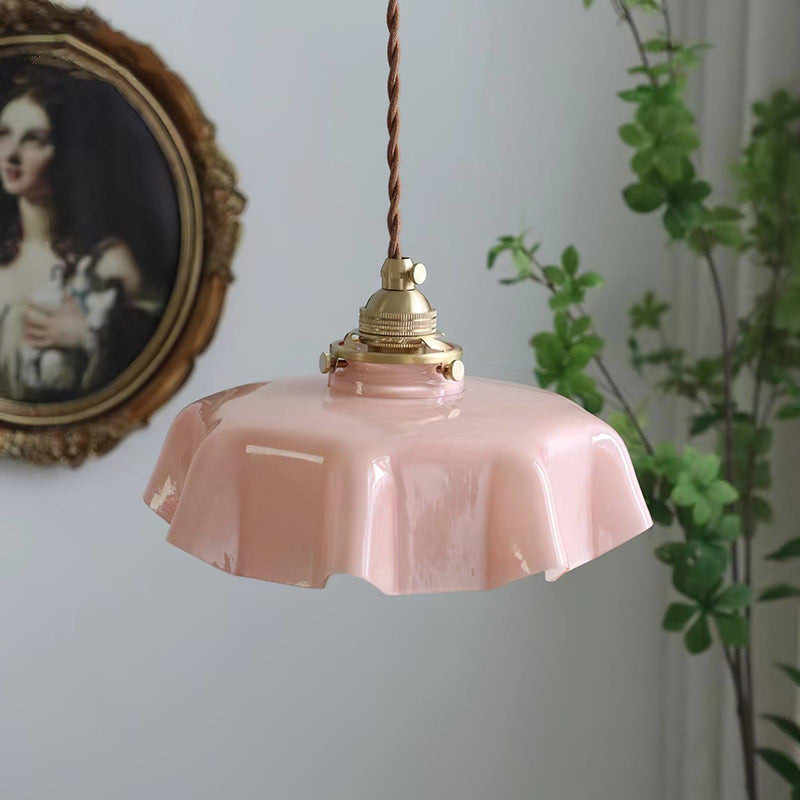Stylish hanging lamp made of glass and copper in yellow, white, pink, and blue. Ideal for modern living spaces or dining areas. 10