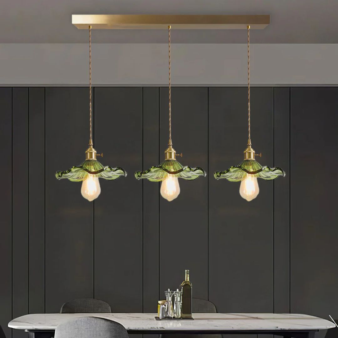 Organic green glass pendant light with brass accents, measuring 23 cm in diameter, ideal for dining rooms and living spaces. 13