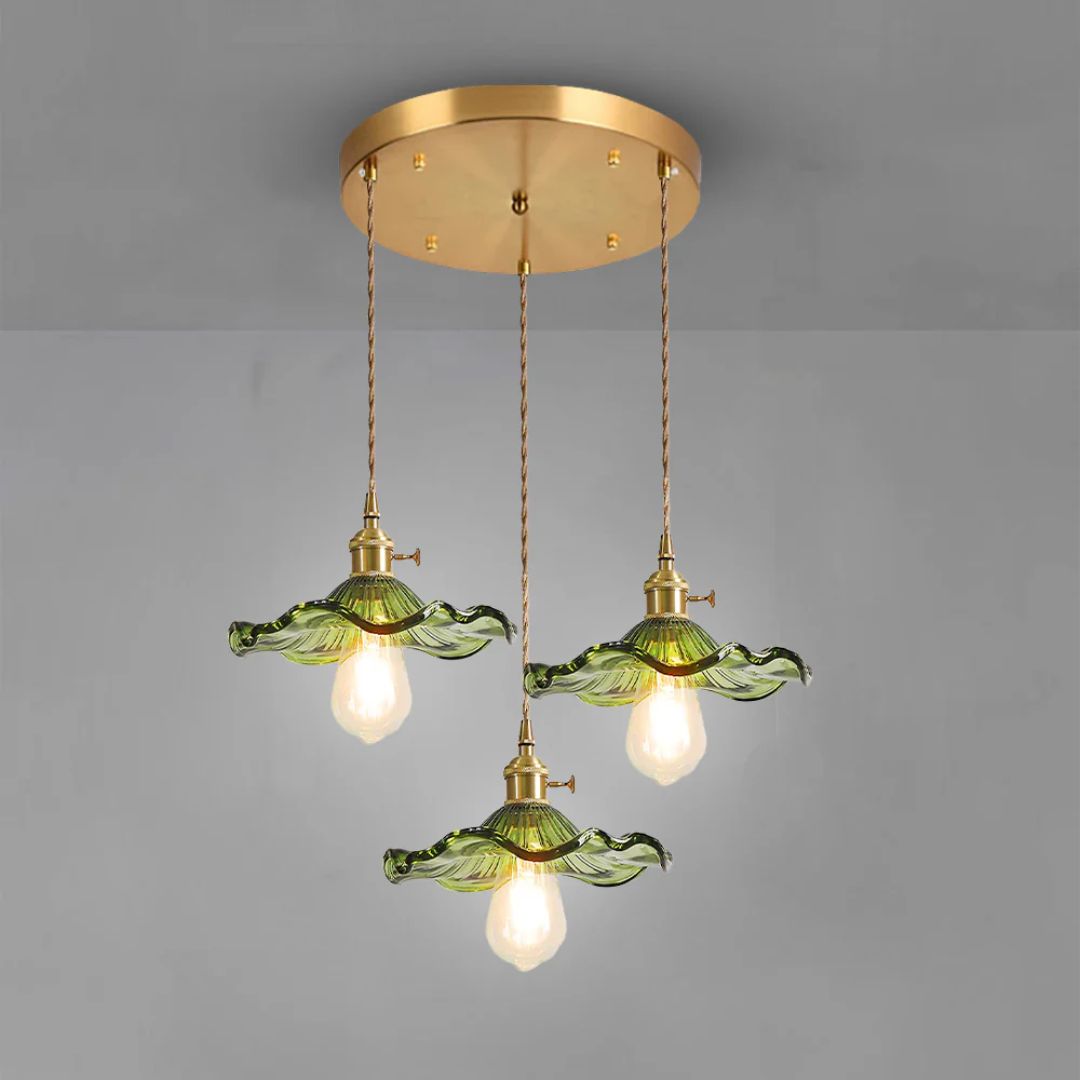 Organic and elegant green glass pendant light with brass accents, measuring Ø 23 cm, ideal for dining rooms and living spaces. 16
