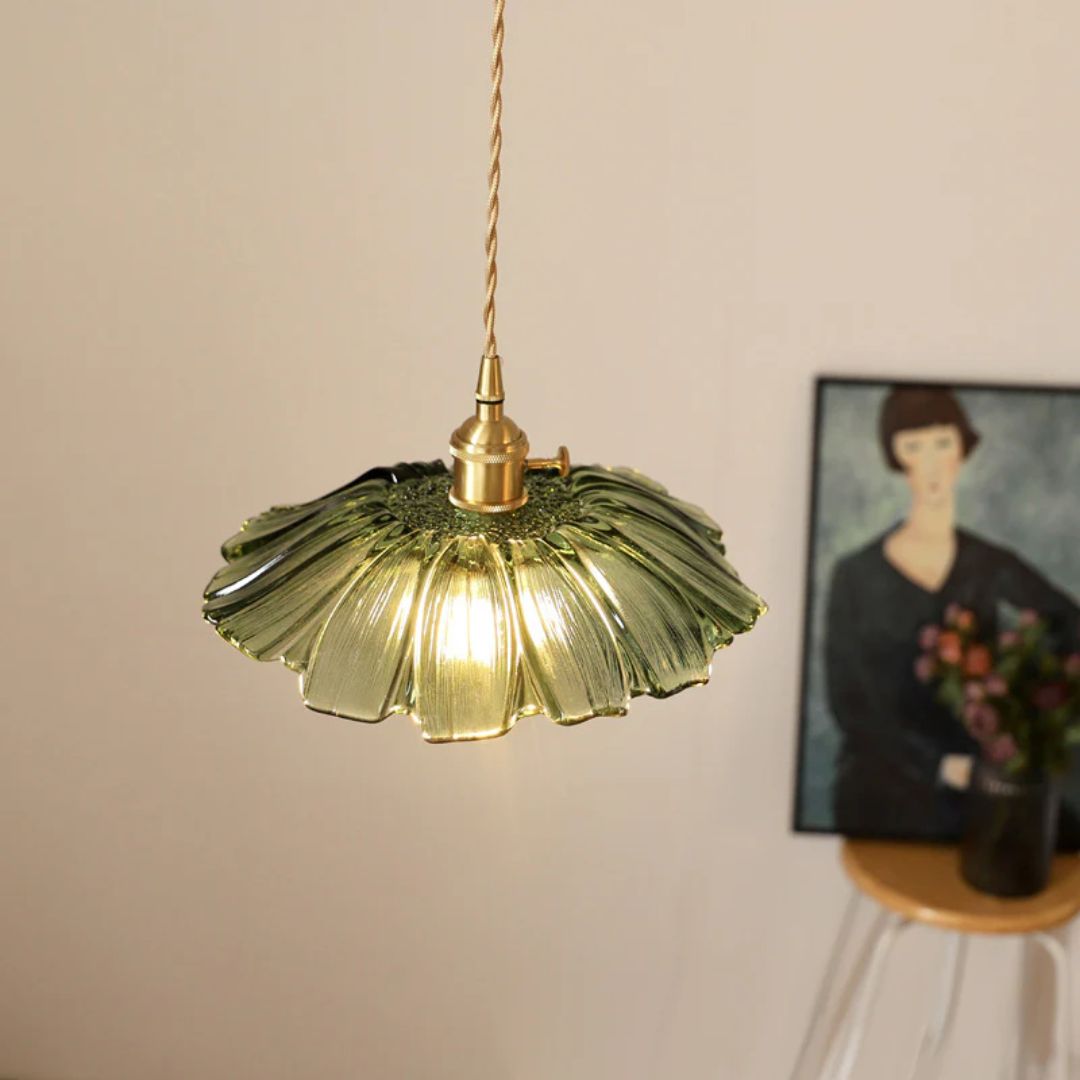 Handcrafted glass pendant light in red and gold, featuring an elegant flower shape. Ideal for dining rooms and living spaces, measuring Ø 28/19 13