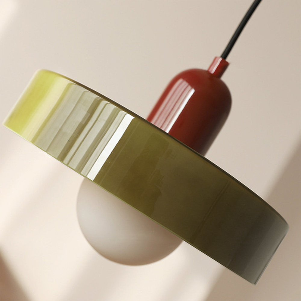 Colorful glass pendant light with a retro design, featuring a G9 bulb fitting. Ideal for dining or living spaces, adding a unique touch. 4
