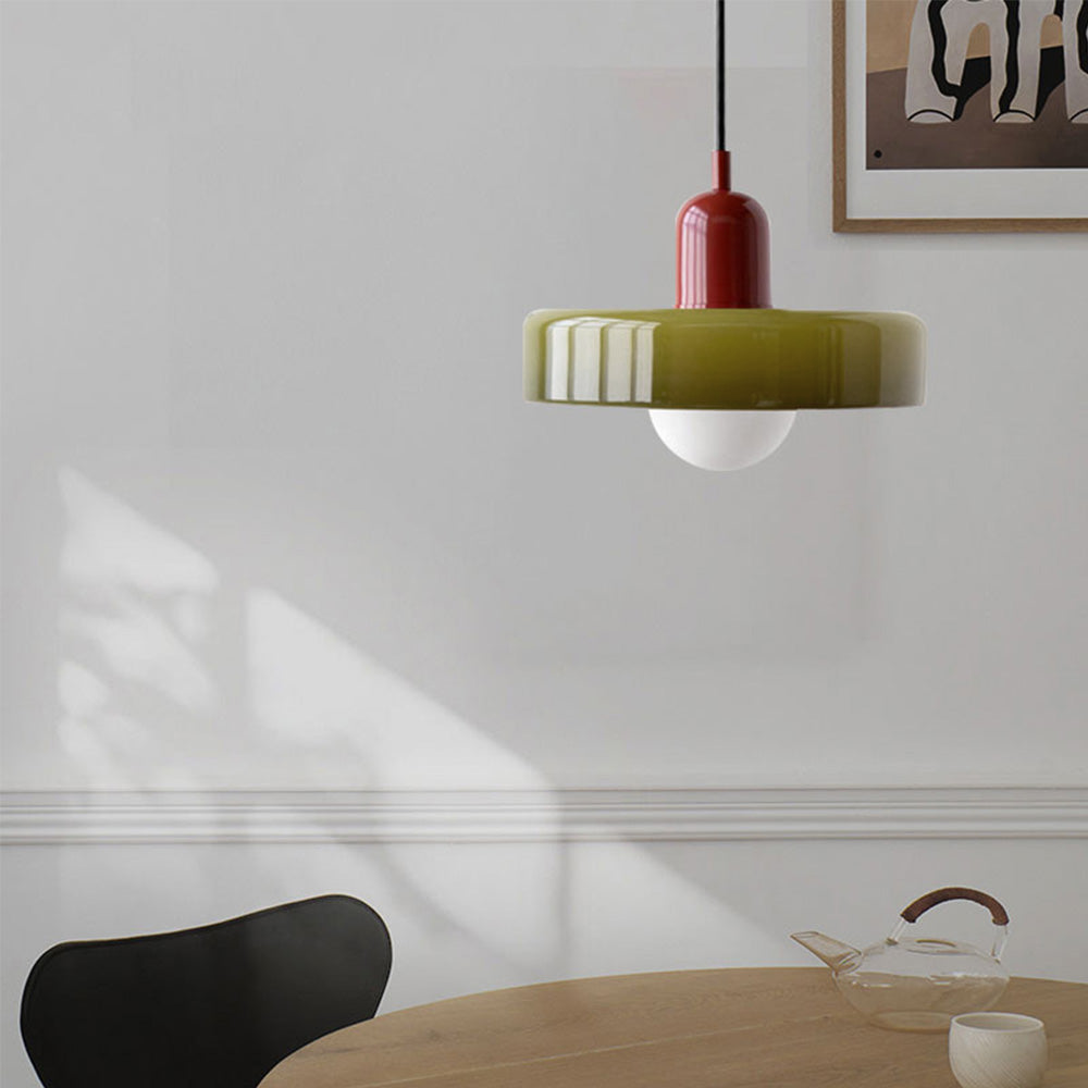 Colorful glass pendant light in a retro design, featuring a G9 bulb fitting. Ideal for dining rooms or modern living spaces. 5
