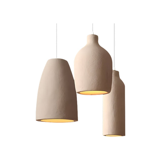White pendant light made of plaster, featuring a round shape with a diameter of 40 cm, ideal for dining or living rooms in a Wabi-S 1