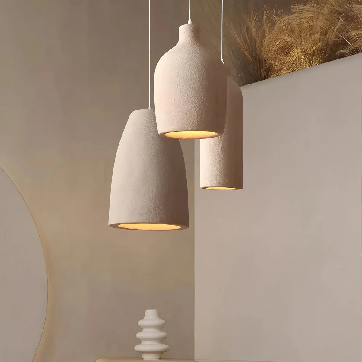 White plaster pendant light in a round shape, measuring 40 cm in diameter. Ideal for dining rooms and living rooms with a Wabi-Sabi aesthetic 8