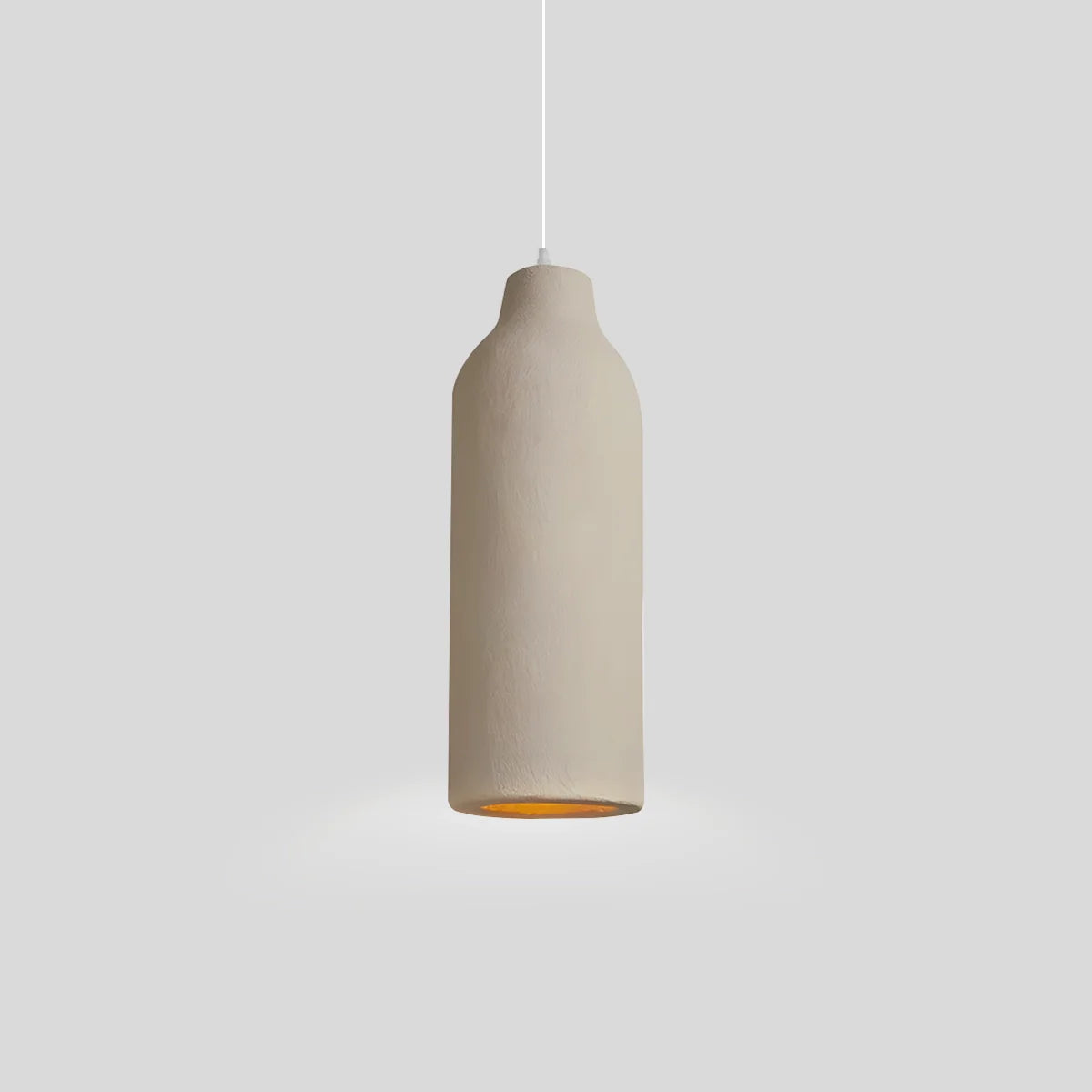 A white pendant light made of gypsum, featuring a 40 cm diameter in a Wabi-Sabi style, ideal for dining and living rooms. 9