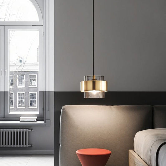 Modern pendant light made of glass in amber and grey, with a diameter of 20 cm, ideal for dining room or living room use. 0