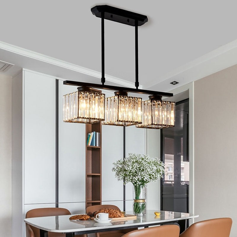 Minimalistic pendant light made of glass and metal, featuring a sleek black finish. Measures 35x70 cm, ideal for dining rooms. 2