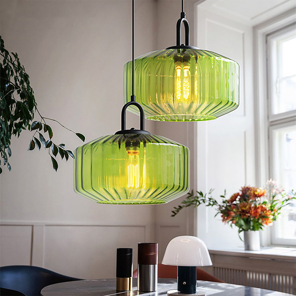 Stylish pendant light made of green glass, 28 cm in diameter, perfect for dining tables and living rooms. 2