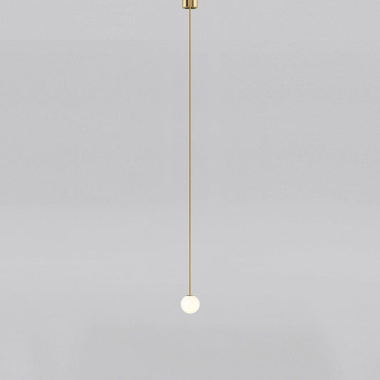 Minimalist pendant light made of brass and milk glass, featuring a 30 cm diameter. Ideal for dining rooms and hallways. 0