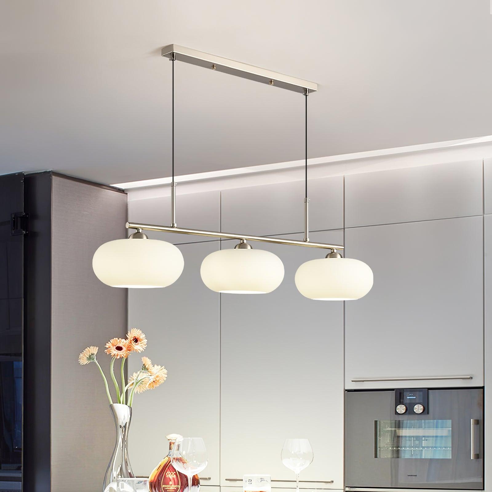 Modern pendant light made of metal in a gold finish, measuring 98 cm, ideal for dining rooms or kitchen islands. 5