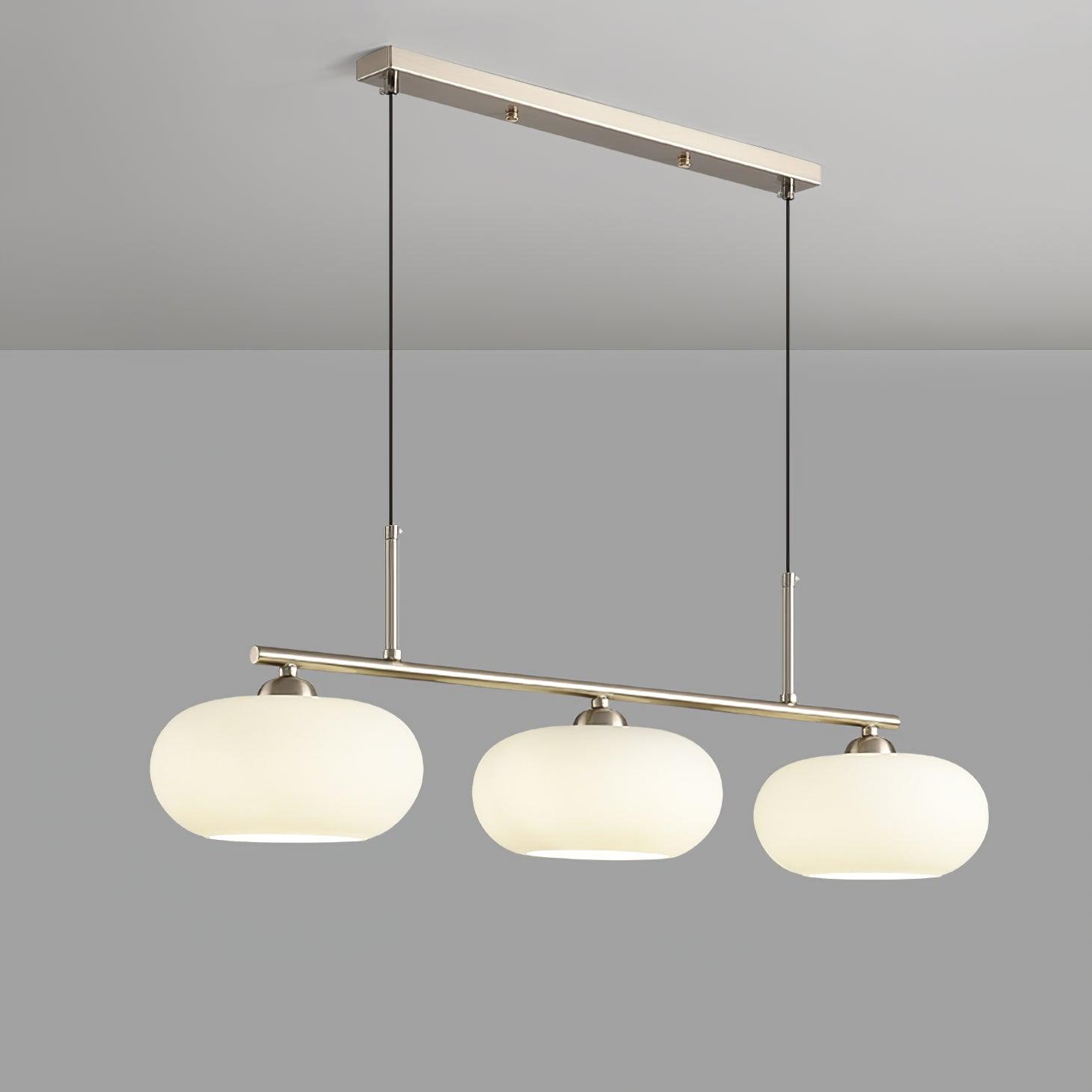 Modern pendant light made of metal in a gold finish, measuring 98 cm. Ideal for dining rooms and kitchen islands. 9
