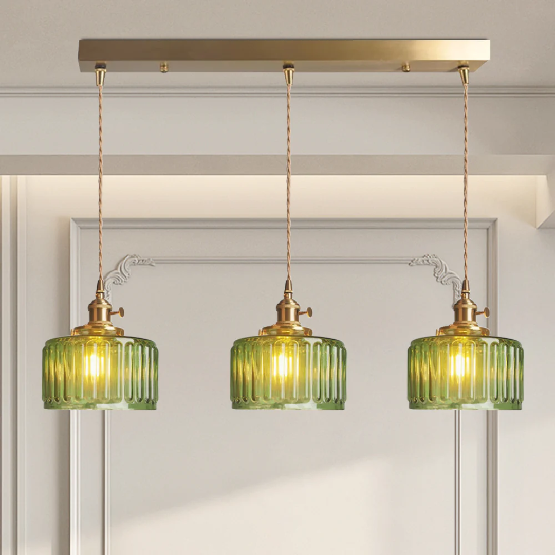 Green ribbed glass pendant light with a diameter of 20 cm, ideal for adding an elegant accent to dining areas or living rooms. 13