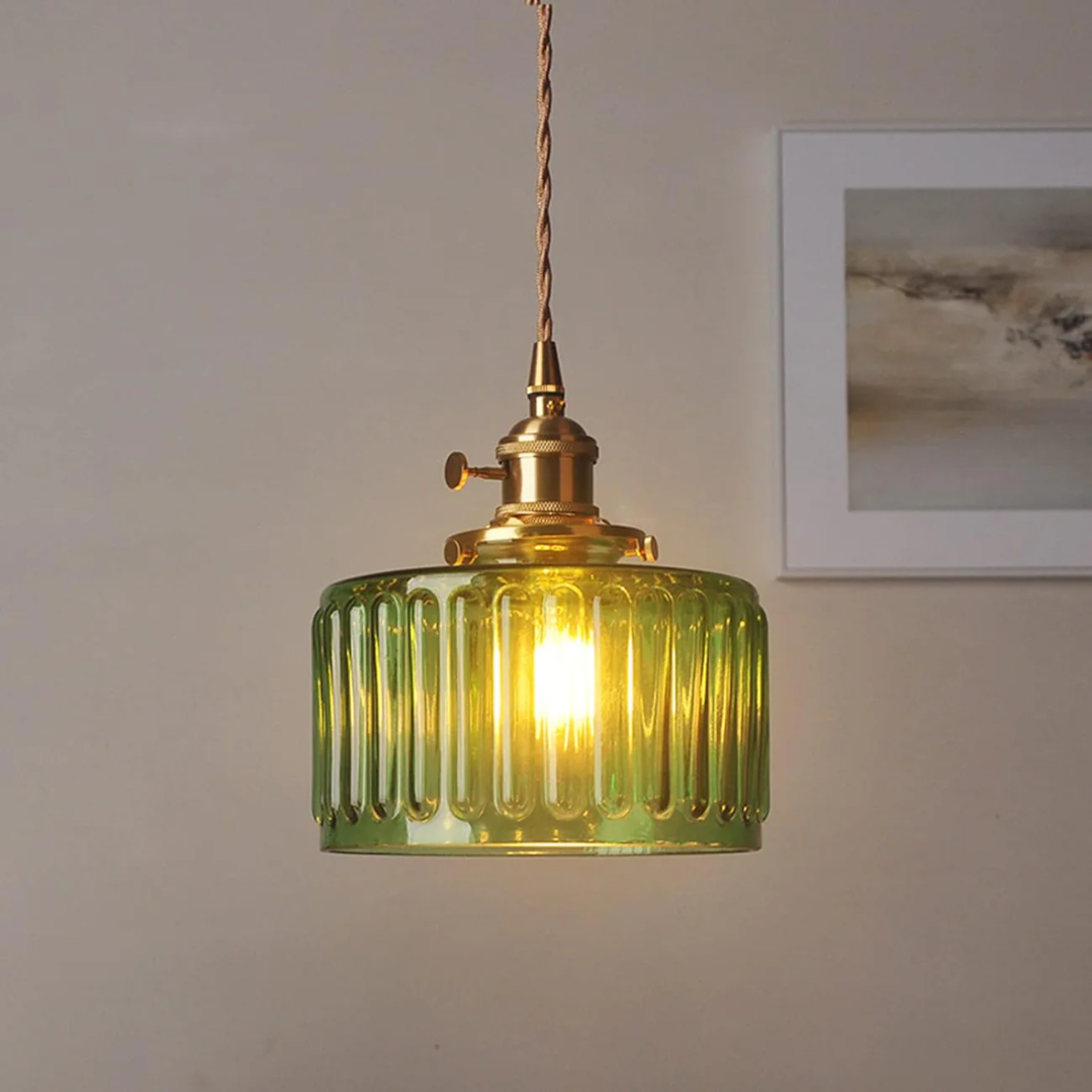 Green ribbed glass pendant light with a diameter of 20 cm, perfect for adding an elegant accent to dining areas or living rooms. 2