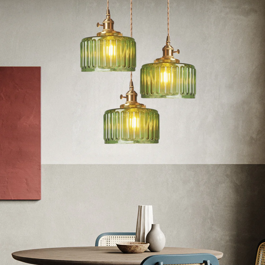 Green ribbed glass pendant light with a diameter of 20 cm, perfect for adding an elegant accent in dining or living spaces. 6