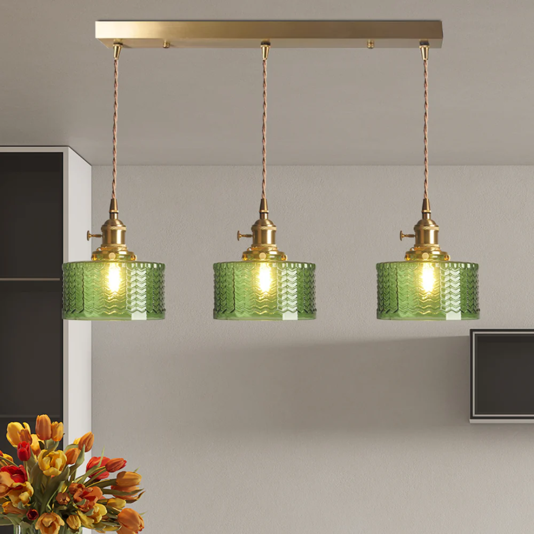 Green ribbed glass pendant light with a 20 cm diameter, ideal for adding an elegant touch to dining or living spaces. 9