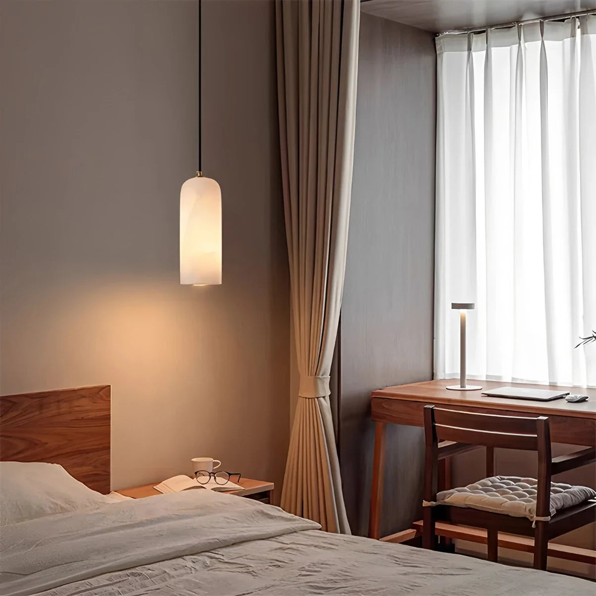 Minimalistic pendant light made of white alabaster, featuring a round shape with a diameter of 40 cm, ideal for modern living spaces. 5